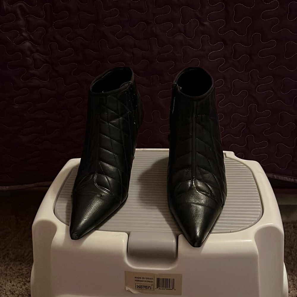 Women black bootie with small heel. Size 7.